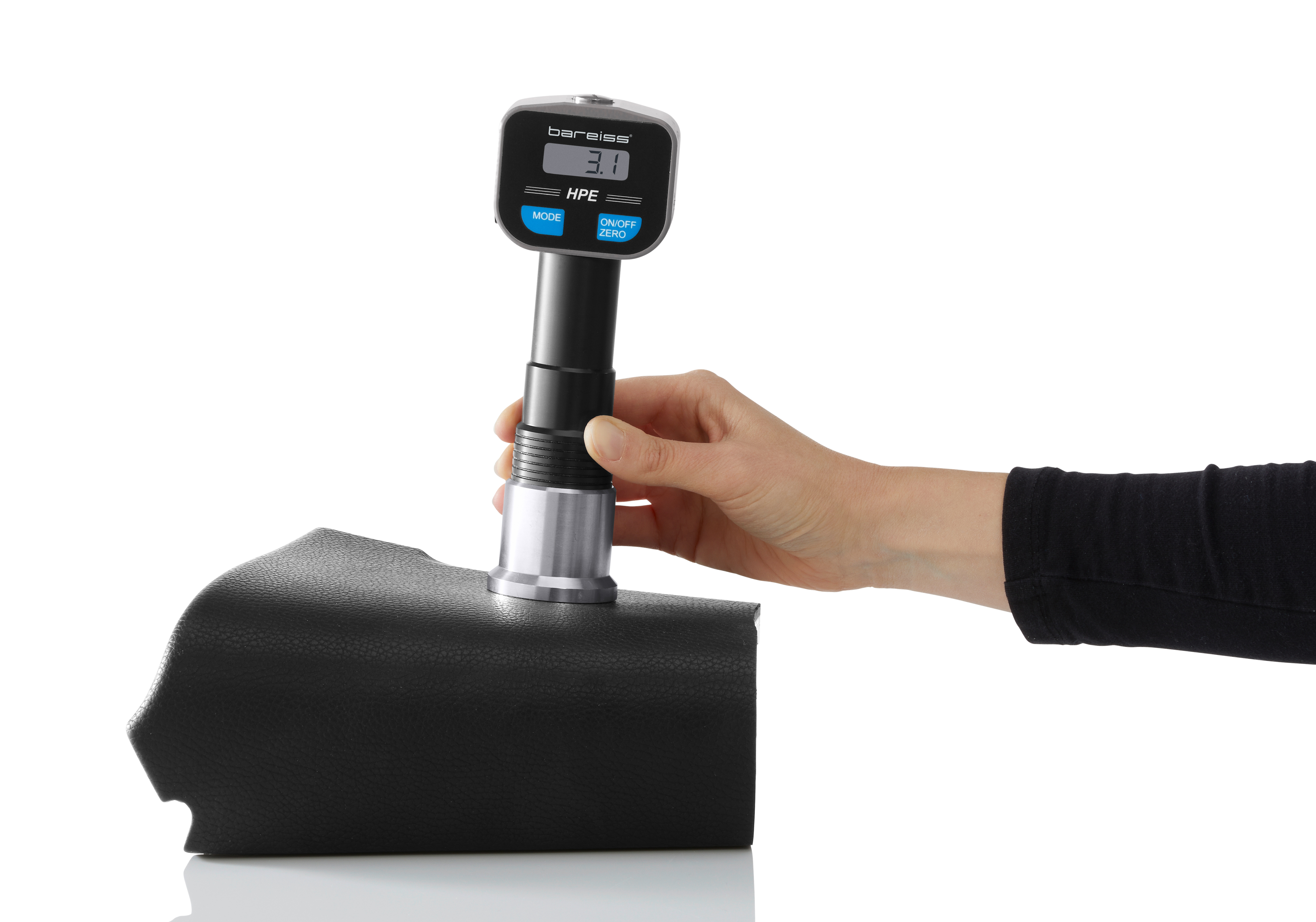 Digital handheld hardness tester Kfz-Interieur / Bauchometer on sample